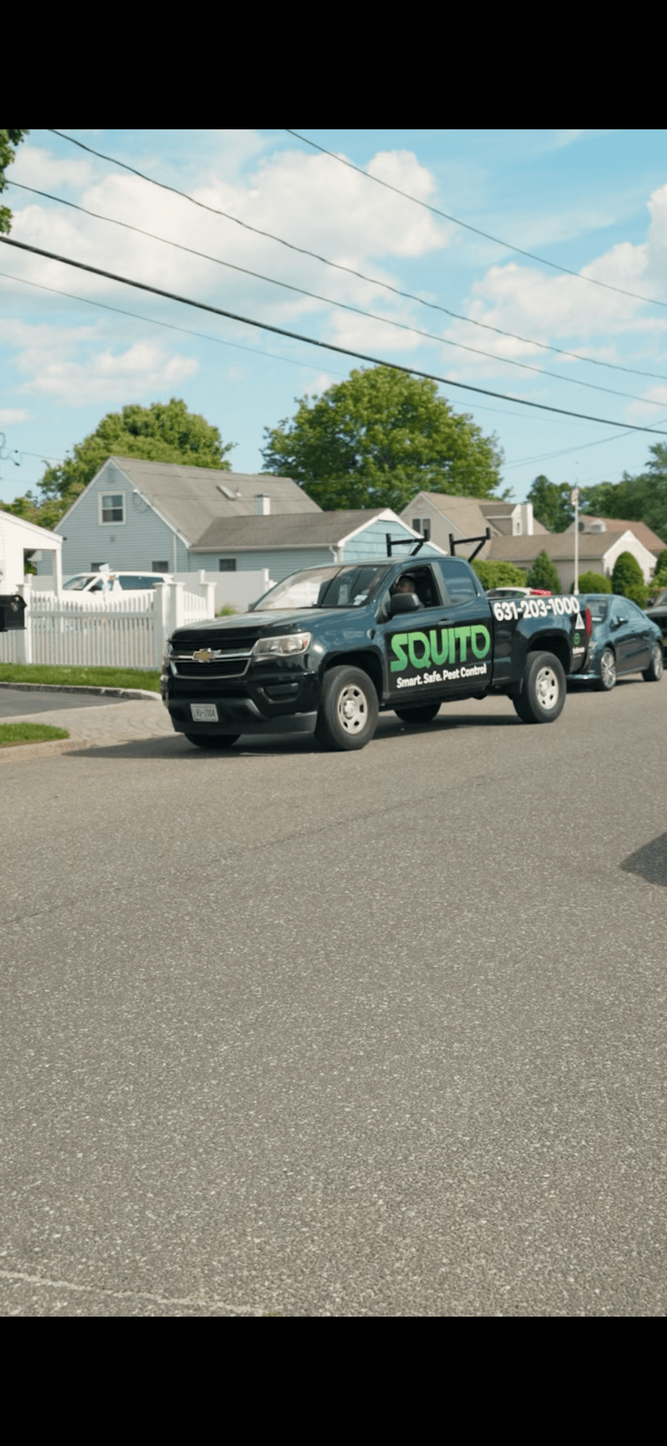 Squito service truck on a Long Island street