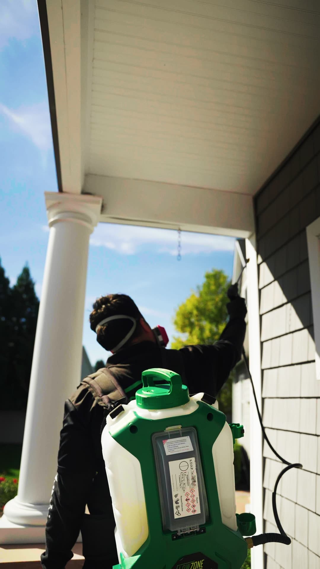 Squito technician treating a Long Island home