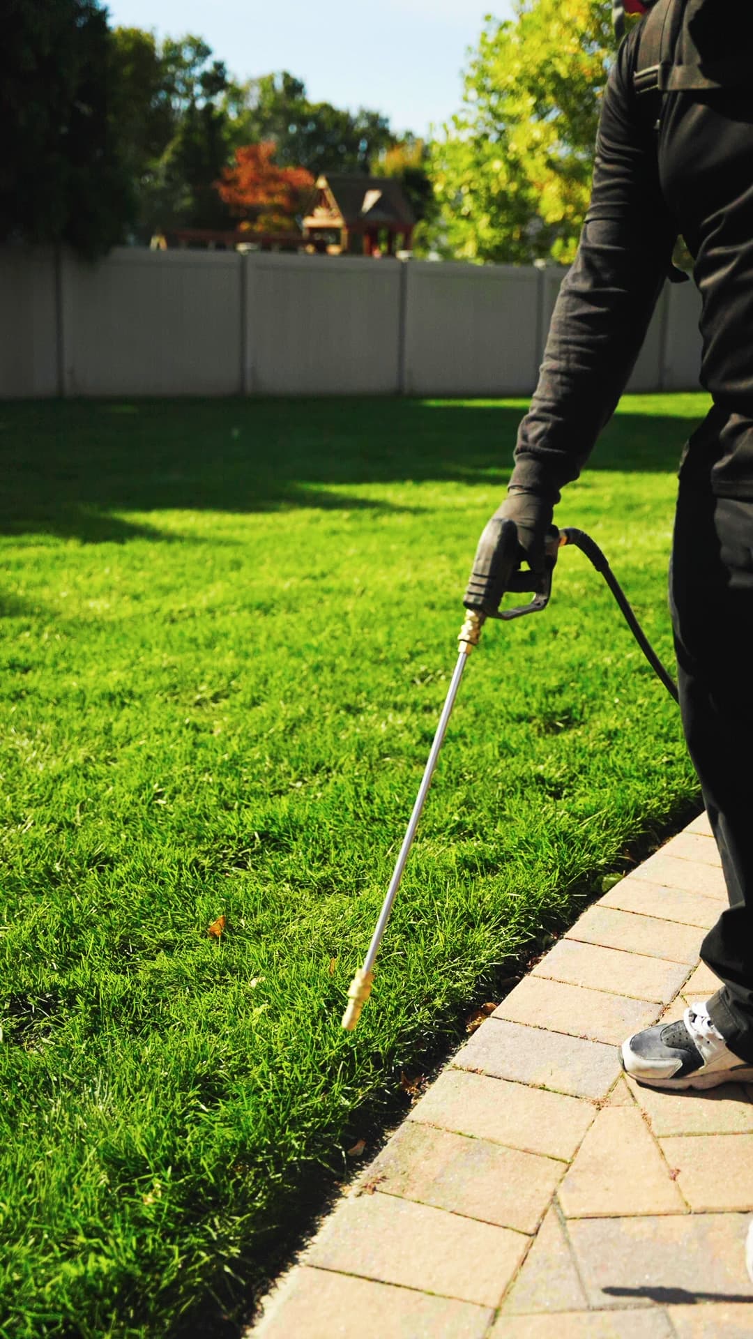 Squito technician treating a Long Island lawn